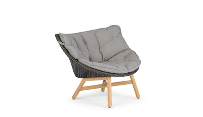 Dedon Mbrace lounge chair with upholstery