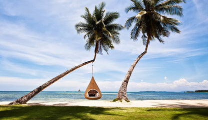 Dedon Nestrest hanging loungeer at beach